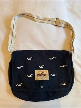Hollister Navy Canvas Messenger Bag with Cream Strap and Embroidered Seagulls